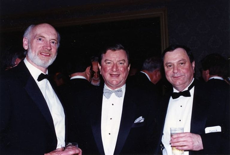 Unidentified, Bill Patrick, and Bresnan at the Cable Pioneers Dinner 1994