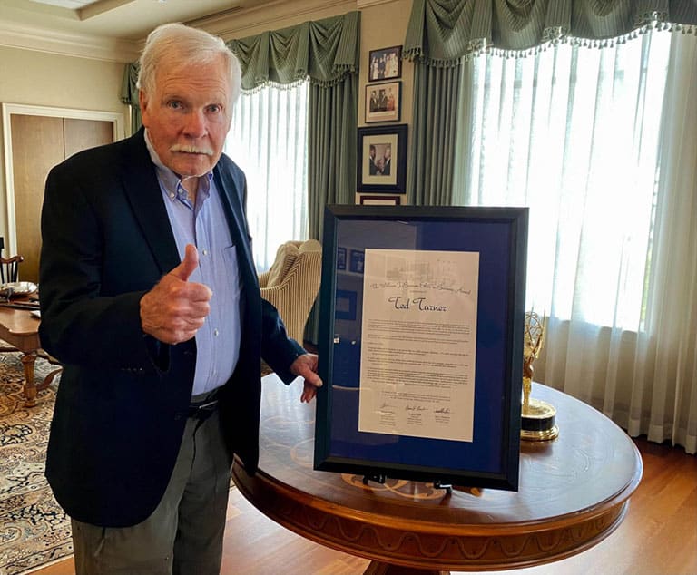 Ted Turner with 2021 Bresnan Ethics In Business Award